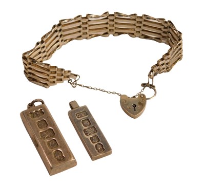 Lot 72 - An Elizabeth II silver gate bracelet, with a...