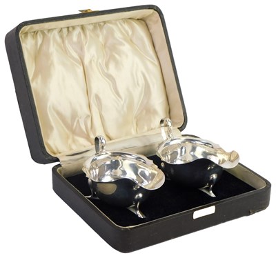 Lot 79 - A pair of George VI silver sauce boats, each...