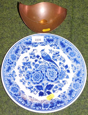 Lot 2235 - A Delft plate, decorated with a bird amongst...