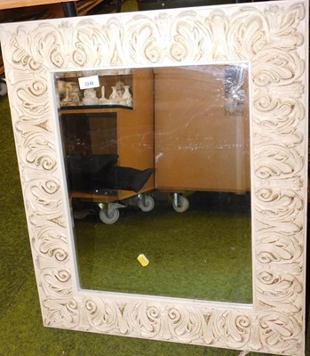 Lot 2248 - A wall mirror, with a scroll and lead...