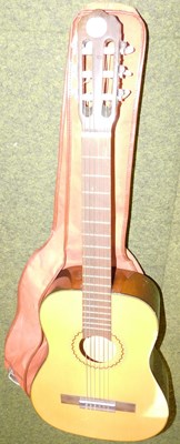 Lot 2251 - An acoustic guitar, in a canvas case.