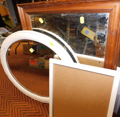 Lot 2262 - A pine framed wall mirror, together with a...