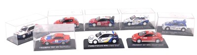 Lot 451 - Eight diecast rally cars, on stands, six with...