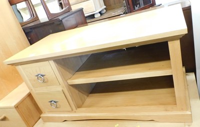 Lot 1008 - A Frank Hudson oak television stand, the...
