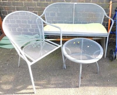 Lot 1020 - A pierced metal two seater garden bench,...