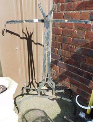 Lot 1033 - A black painted cast iron balance scale, 107cm...