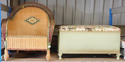 Lot 1044 - A wicker armchair, together with a Lloyd Loom...