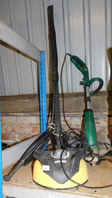 Lot 1053 - A Wickes electric strimmer, together with a...