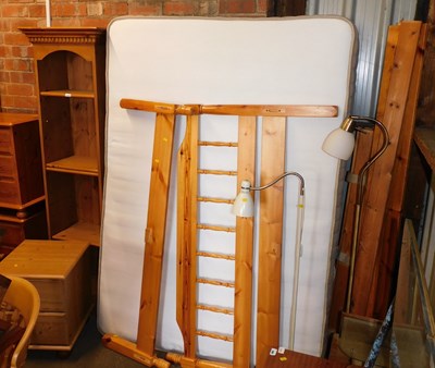 Lot 1058 - A pine framed small double bed, comprising...