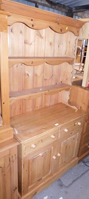 Lot 1068 - A pine dresser, the top with a moulded edge...