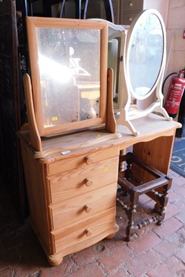Lot 1092 - A pine dressing table, the raised back above...