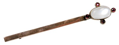 Lot 538 - A Victorian moonstone tie pin, set with four...