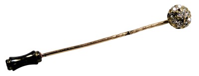 Lot 542 - An Edwardian diamond tie pin, in a flower head...