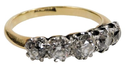 Lot 532 - A diamond five stone ring, set with five...