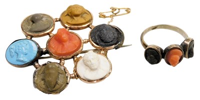 Lot 539 - A Victorian lava cameo brooch, set with eight...