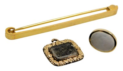 Lot 558 - A 9ct gold pin, 2.0g, 9ct gold and mother of...