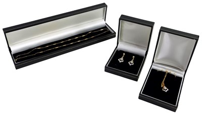Lot 226 - A suite of jewellery, comprising a pair of...