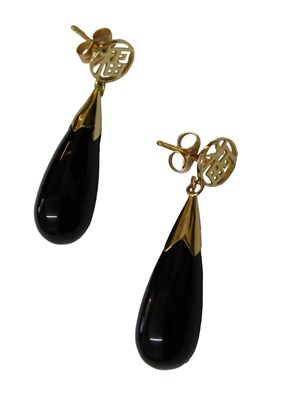 Lot 218 - A pair of Chinese onyx drop earrings, the...
