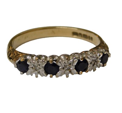 Lot 58 - A 9ct gold sapphire and diamond ring, set with...