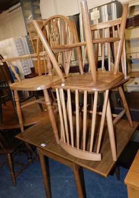 Lot 1139 - An oak drop leaf kitchen table, together with...