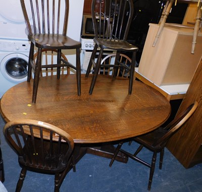Lot 1149 - A 20thC oak dining table, with an oval top,...