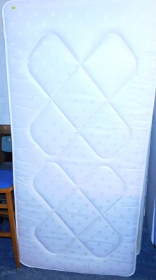 Lot 1153 - A single bed, comprising mattress and divan...