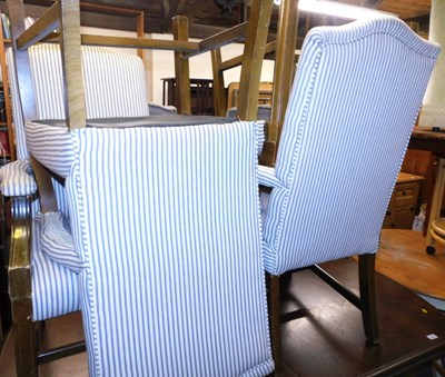 Lot 1170 - A set of four oak framed upholstered armchairs,...
