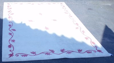 Lot 1179 - A cream ground rug, decorated with a border of...