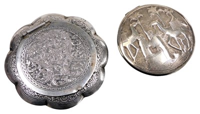 Lot 590 - An Egyptian compact, embossed with figures in...