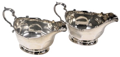 Lot 594 - A pair of George V silver sauce boats, of semi...