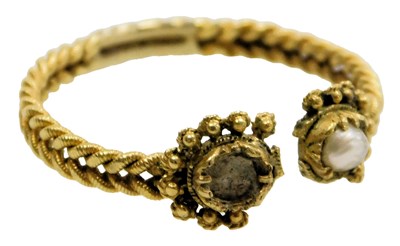 Lot 560 - A ring, possibly 17thC, set with a pearl, the...