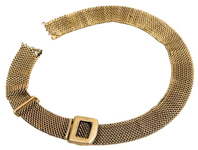Lot 562 - A mesh and buckle watch strap, yellow metal,...