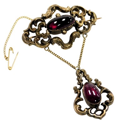 Lot 564 - A Victorian cabochon set pendant brooch, in...