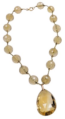 Lot 569 - A citrine necklace, of sixteen faceted beads,...