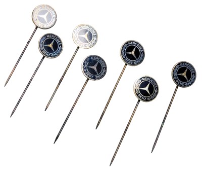 Lot 682 - Seven Mercedes Benz tie pins.