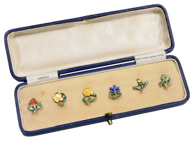 Lot 683 - A set of six Amnora white metal and enamel cup...