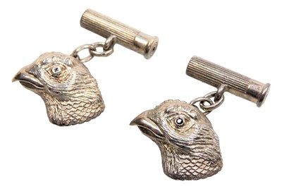 Lot 571 - A pair of silver grouse's head and cartridge...