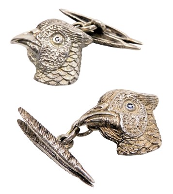 Lot 572 - A pair of silver pheasant's head and feathers...