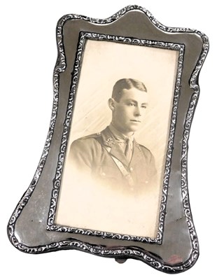 Lot 615 - A silver backed strut photograph frame, with...