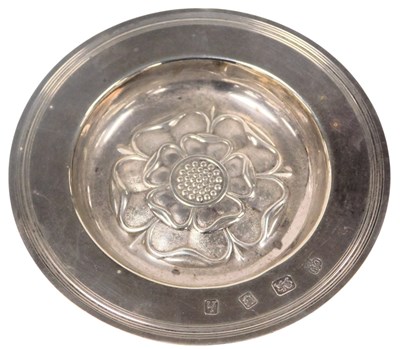 Lot 618 - An Elizabeth II silver circular dish, embossed...