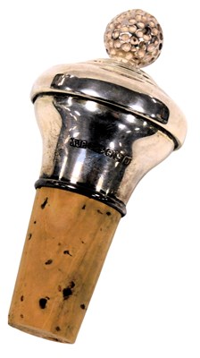 Lot 546 - An Elizabeth II silver mounted bottle stopper,...