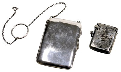 Lot 685 - A George V silver cigarette case, with a chain...
