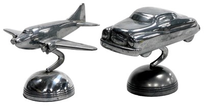 Lot 656 - A pewter desk stand, modelled as a motor car,...