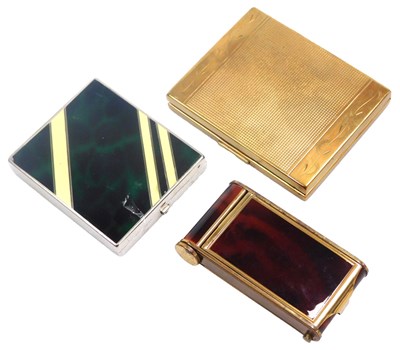 Lot 697 - An Art Deco brass and faux wood musical...