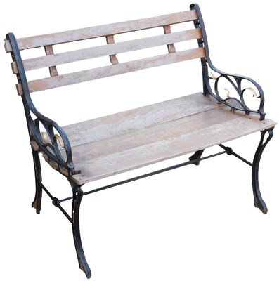 Lot 734 - A wooden garden bench, with cast iron scroll...