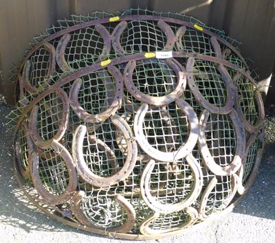 Lot 1193 - A pair of cast iron hay rack planters, formed...