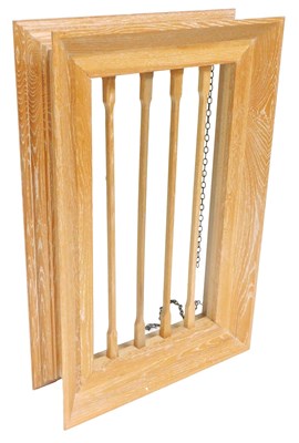 Lot 756 - A limed oak hanging pot rack, with fret work...