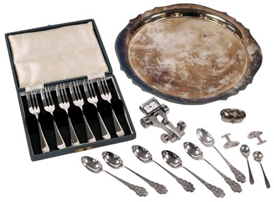 Lot 703 - A silver plated salver, plated cake forks,...