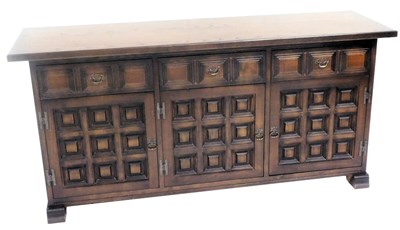 Lot 748 - A Younger dark oak sideboard, with three...