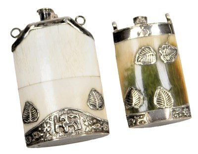 Lot 705 - Two Chinese bone snuff bottles, with white...